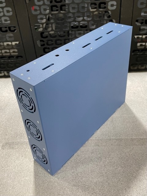 Fabricated electronic cabinet with fitted lid, manufactured by Mikron Manufacturing